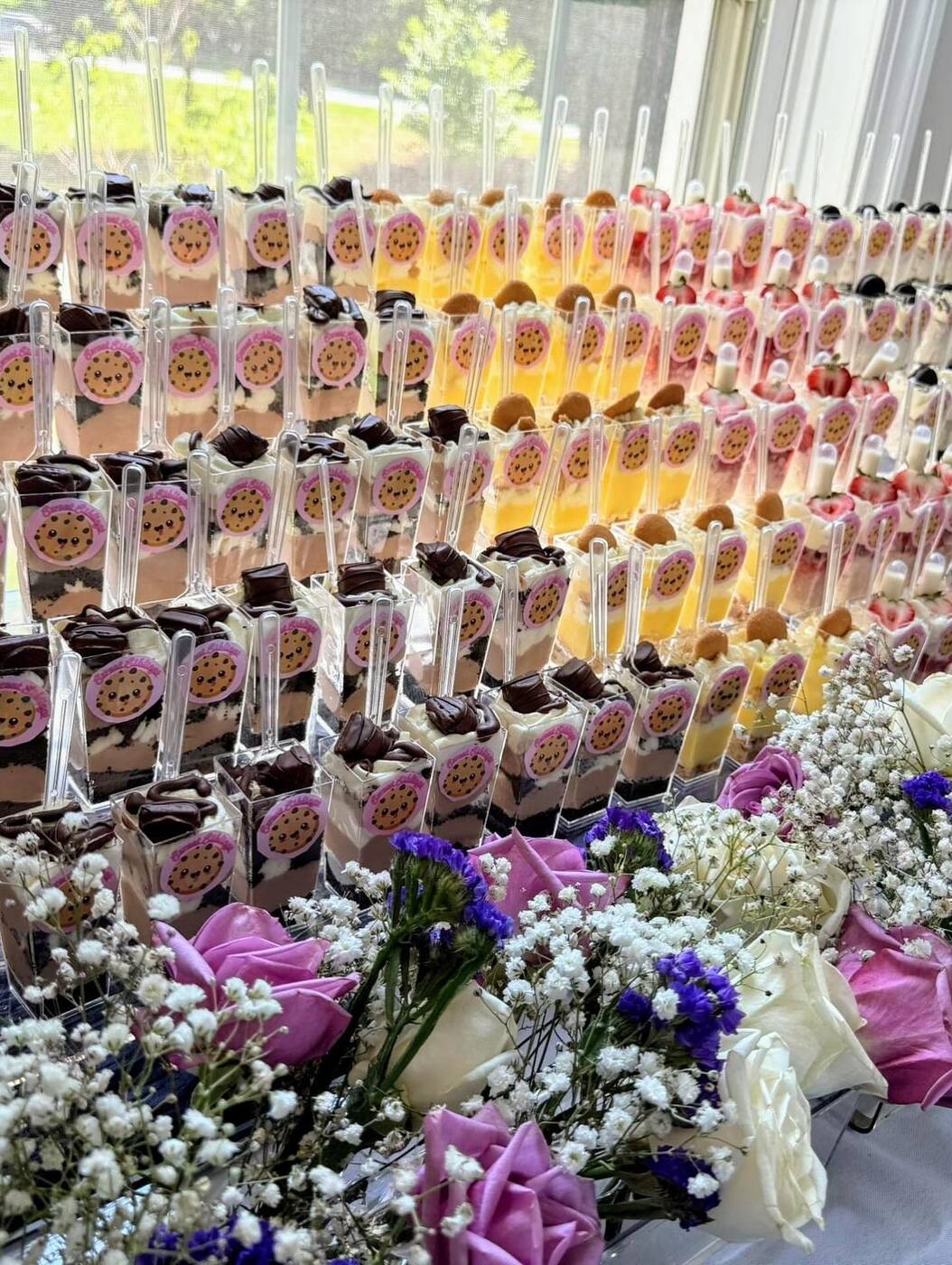 Rows of layered dessert cups