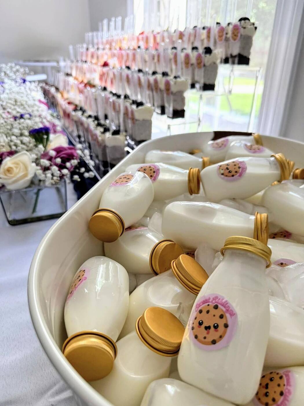 Milk shot bottles with Sweet Siblings labels